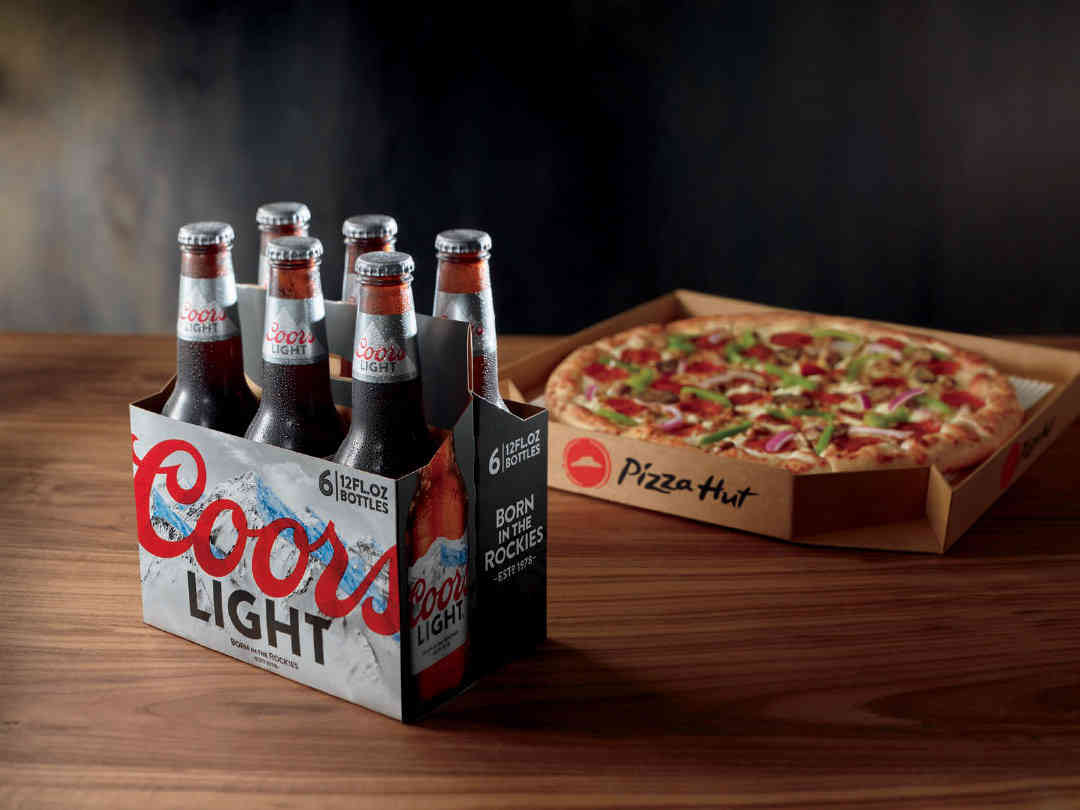 Six-pack of Coors Light and a Pizza Hut pizza
