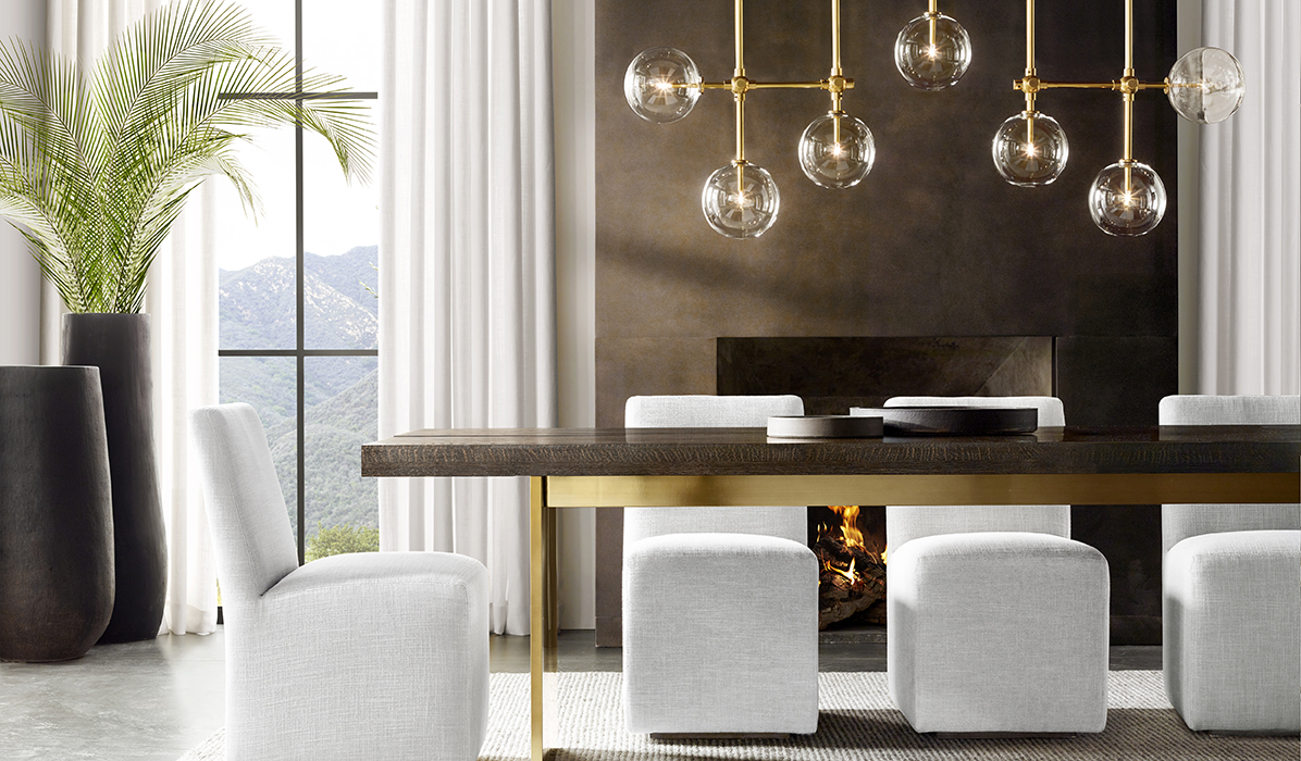 A high-end dining room set from RH in a gallery setting..