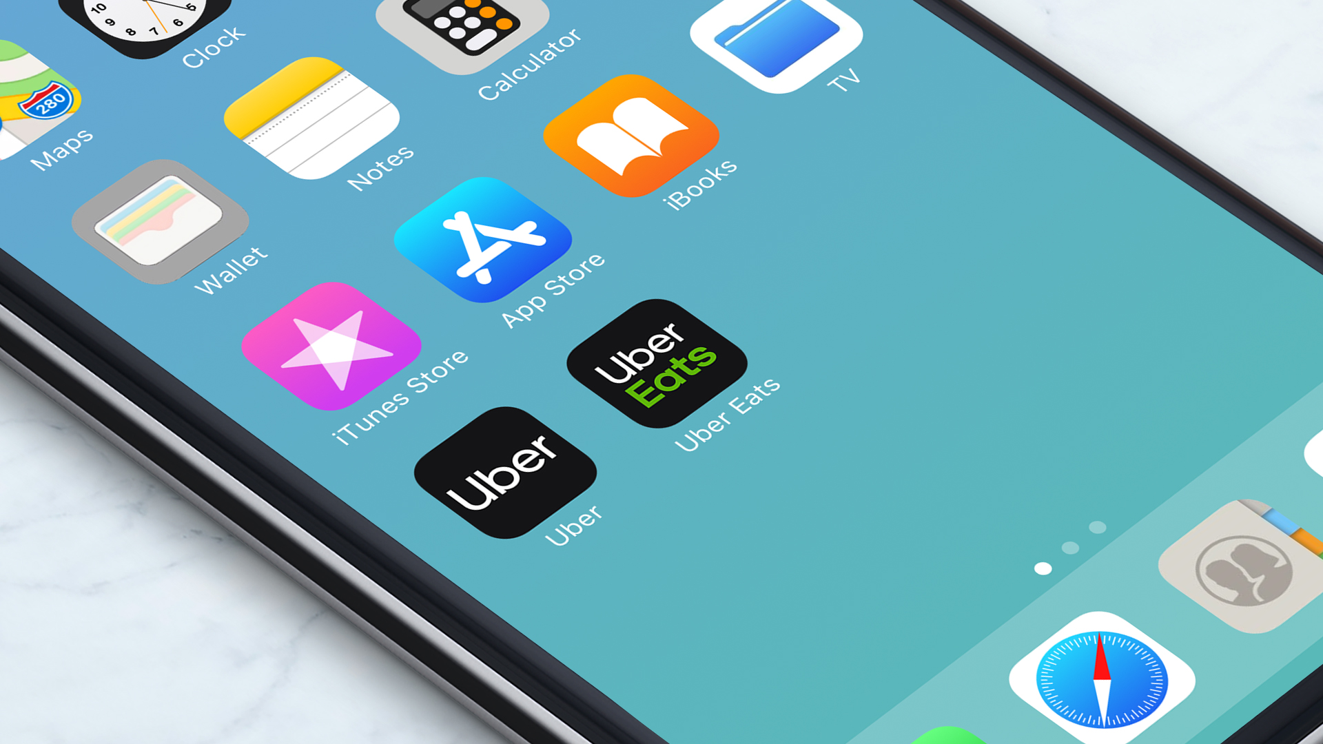Uber and Uber Eats apps displayed on an iPhone