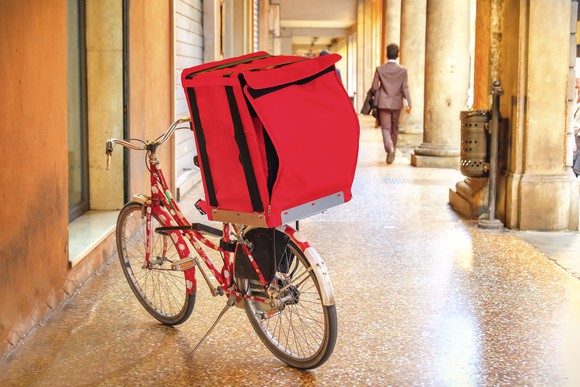 Red food delivery bicycle.