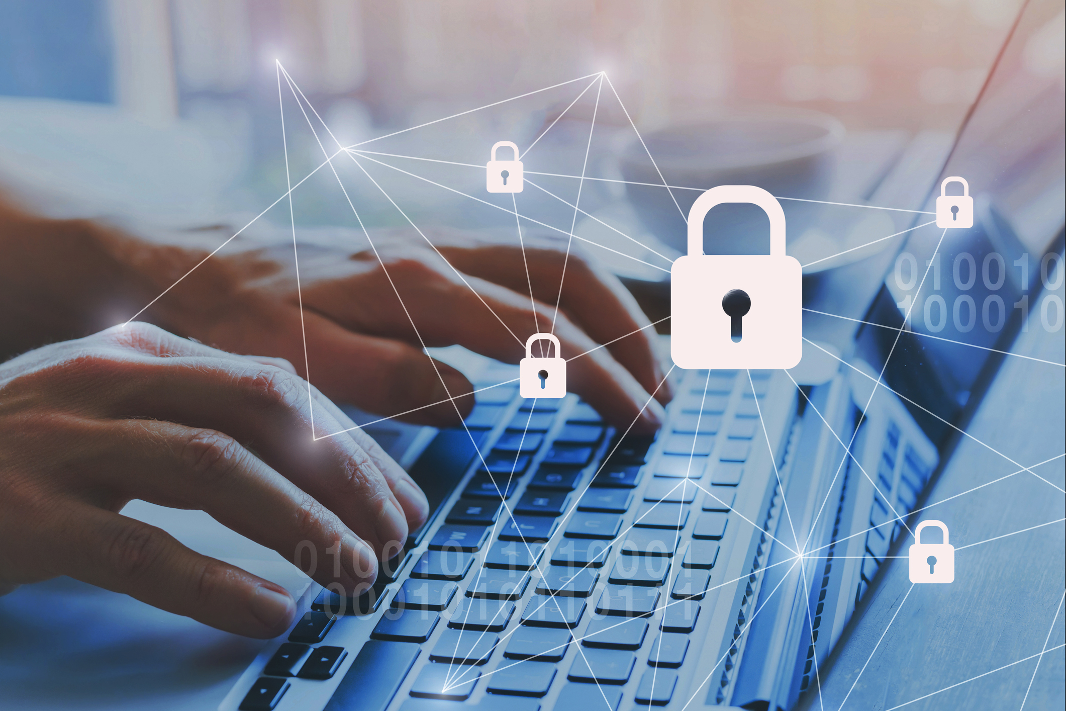 A person using a laptop and a network of lock icons.