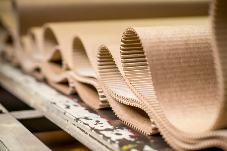 Corrugated cardboard folded into loops.