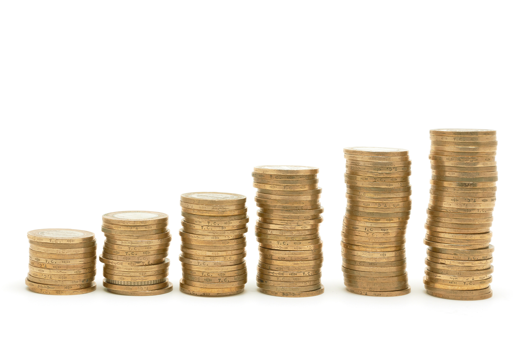 Gold coins in the shape of a rising chart.
