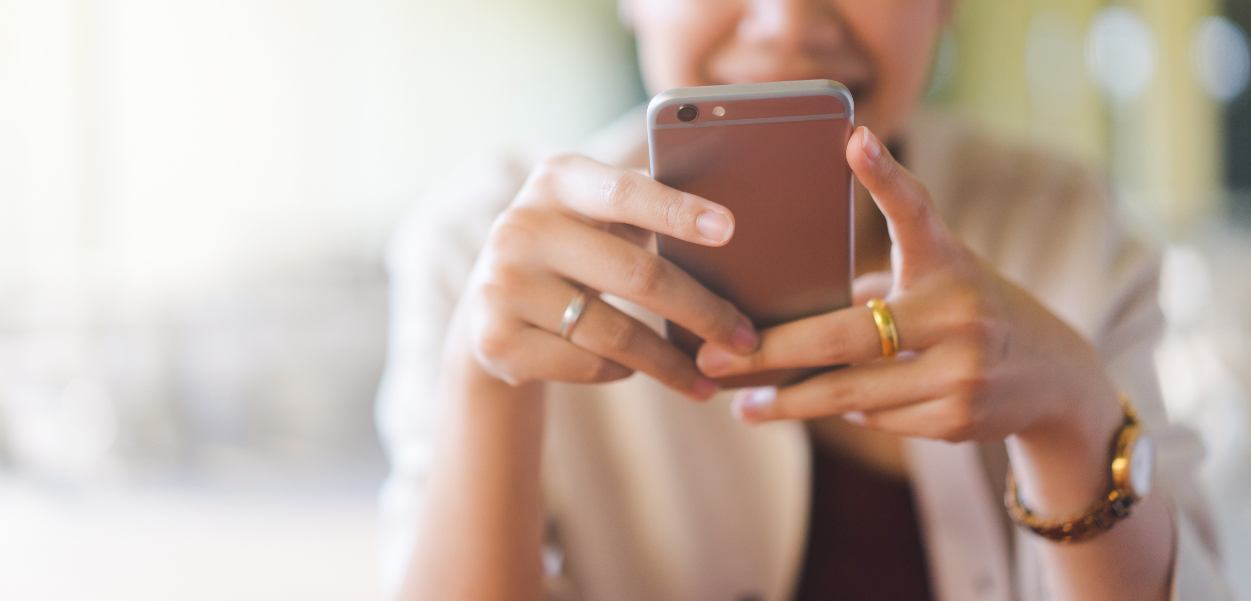 woman looking at her phone