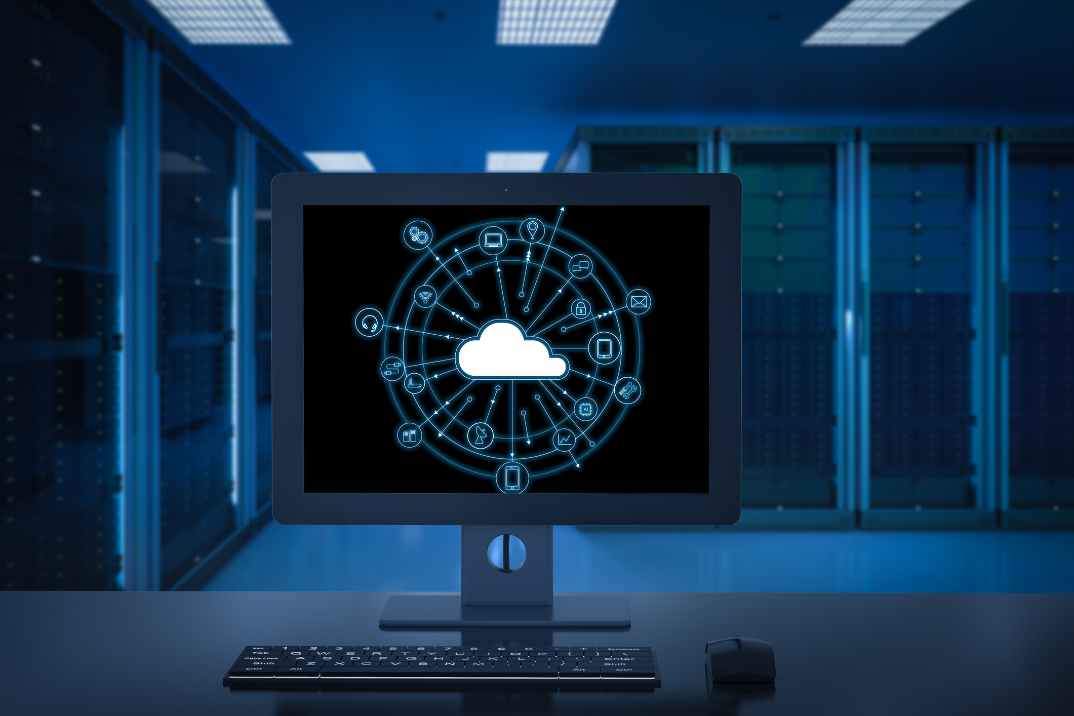 A computer screen in the middle of a dark data center, displaying a cartoon-style cloud.