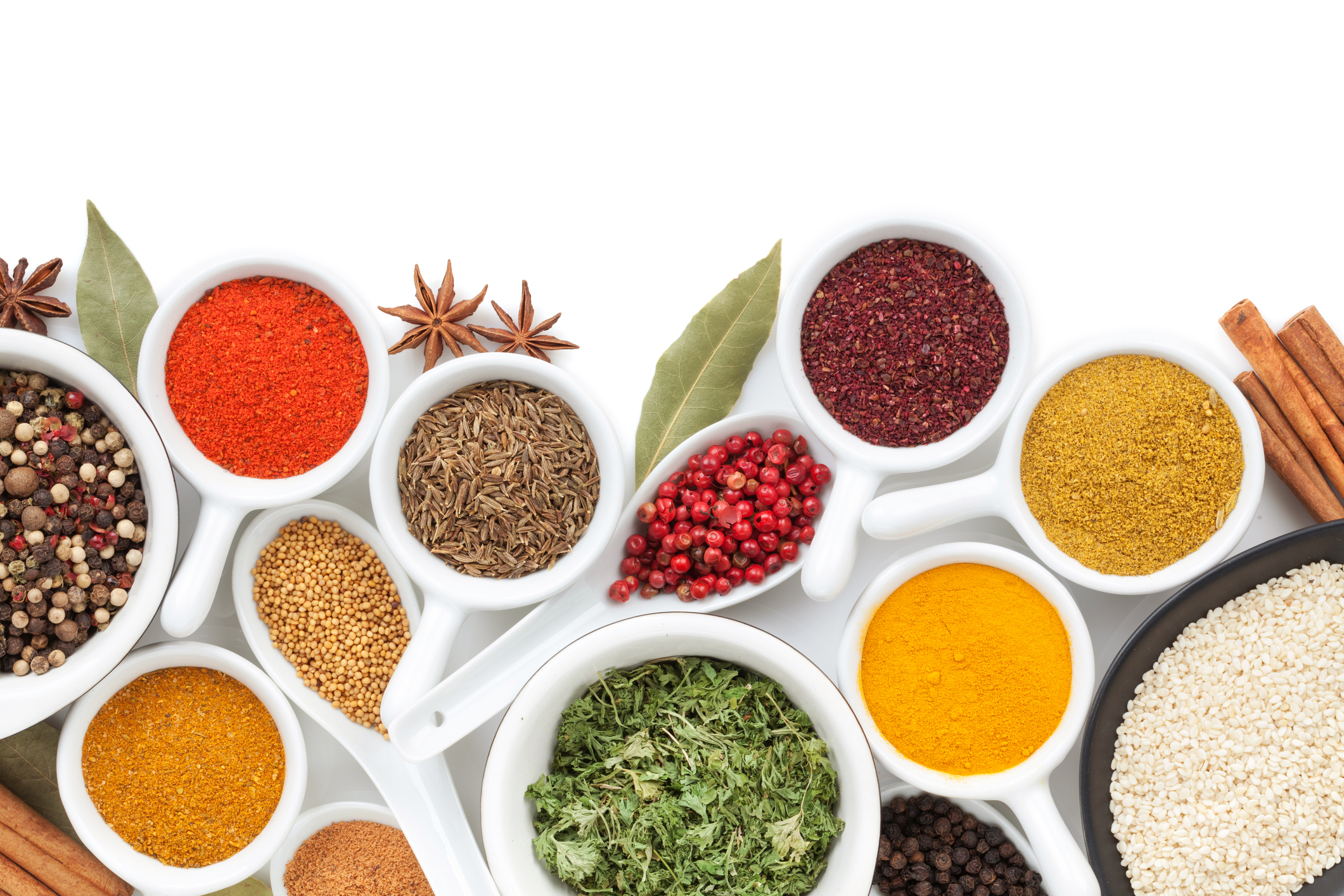 An assortment of cooking spices on a counter.