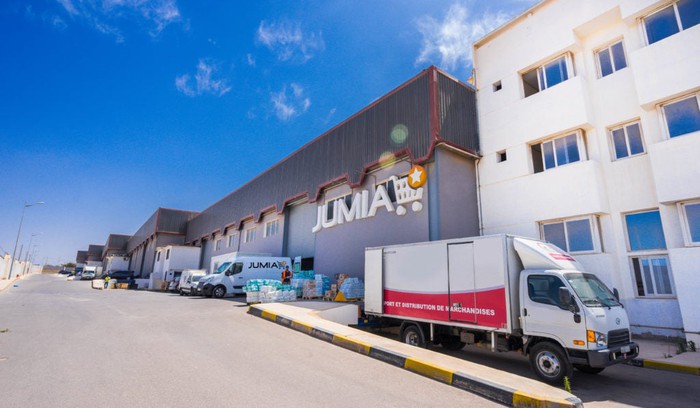 A Jumia warehouse with a truck in front