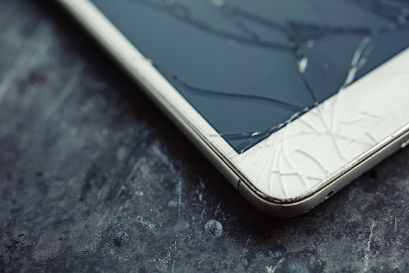 A smartphone with a cracked screen.
