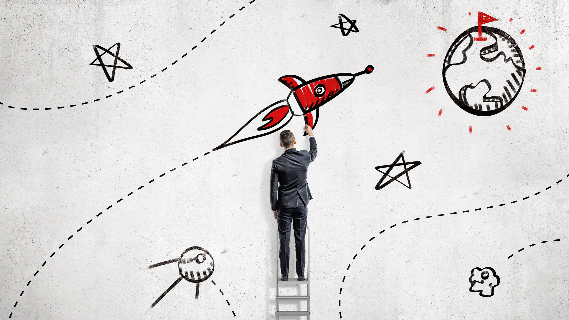 man in a suit drawing rocket into space