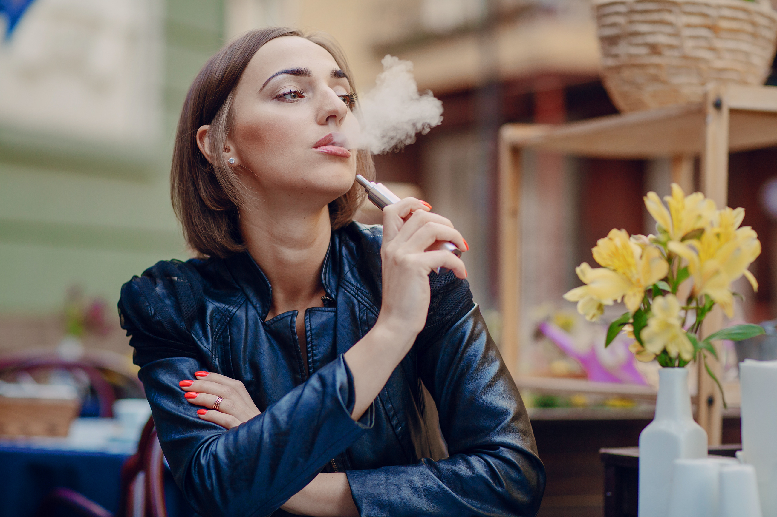 Woman with vape pen