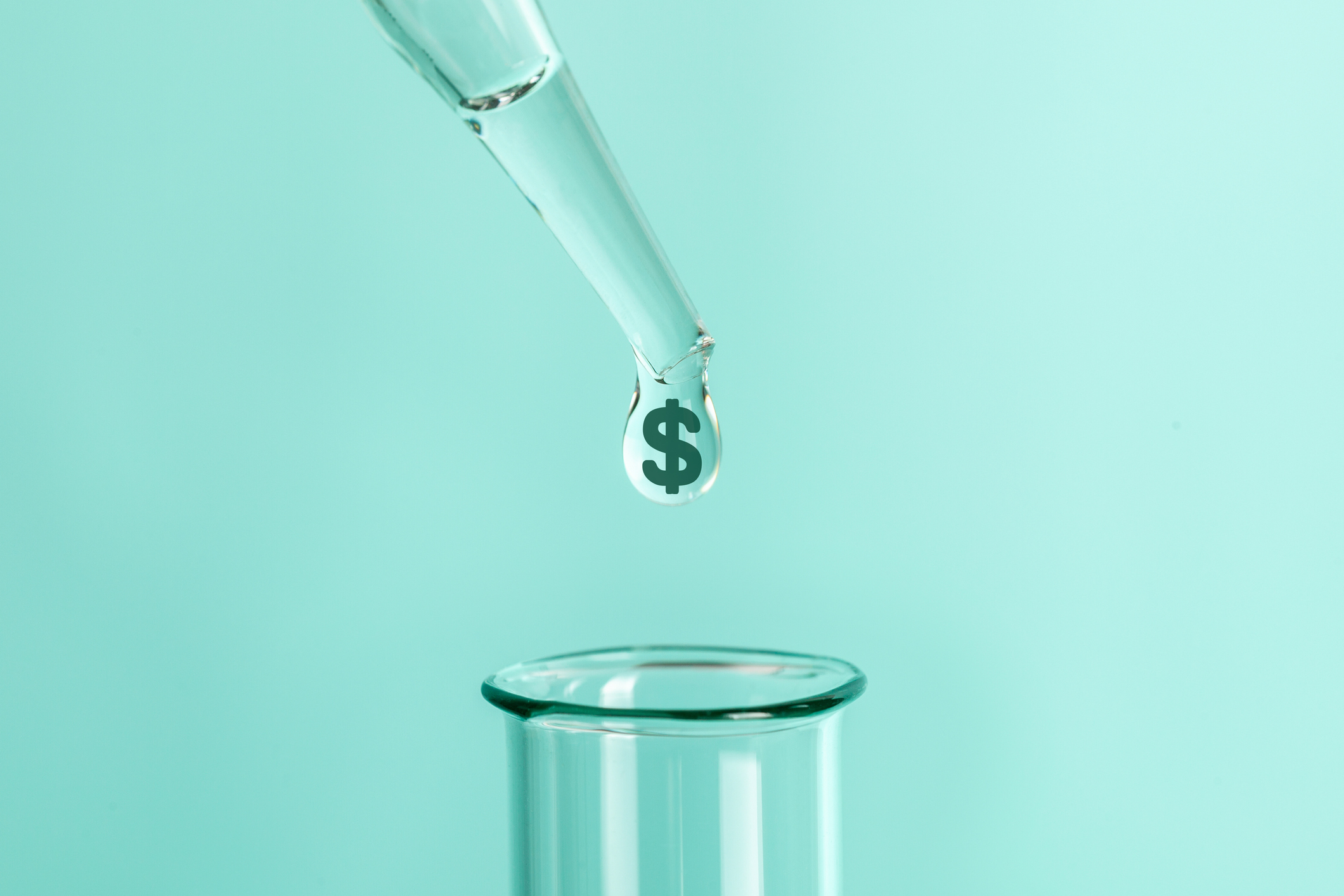 A pipette with a droplet of liquid with a dollar sign on it about to fall into test tube