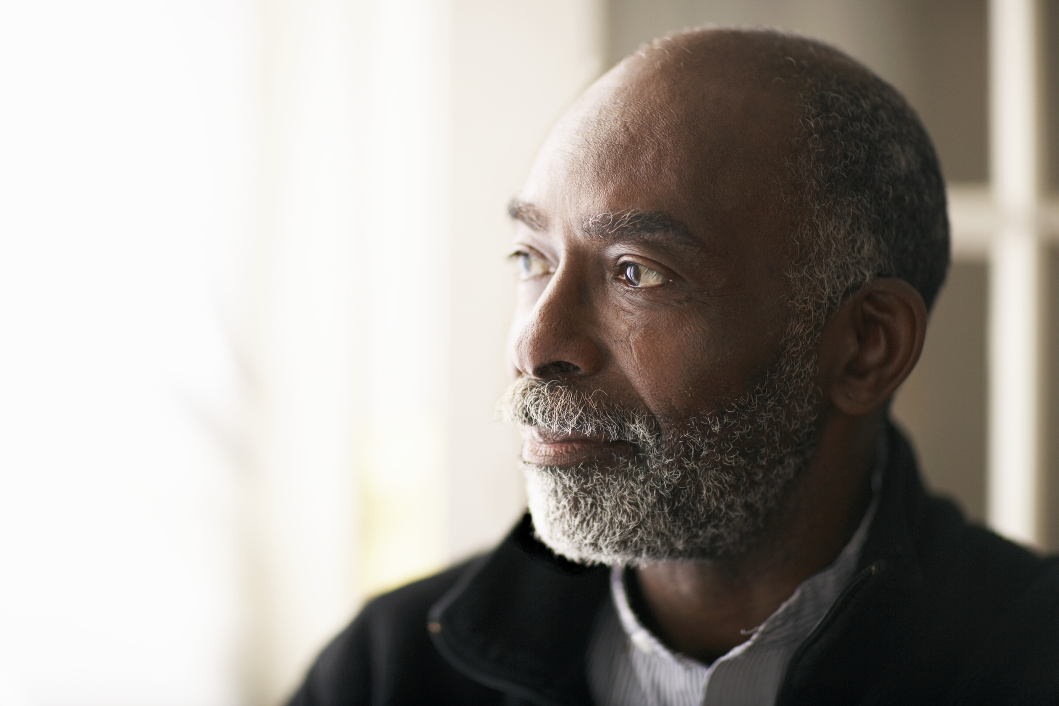 Close-up of older man with serious expression
