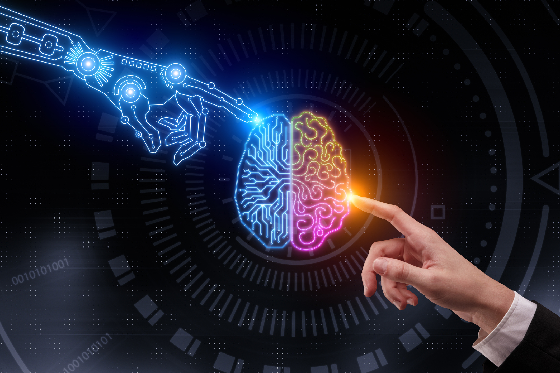 A robot hand and a human hand touch two halves of a brain.