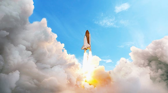 A space shuttle taking off.