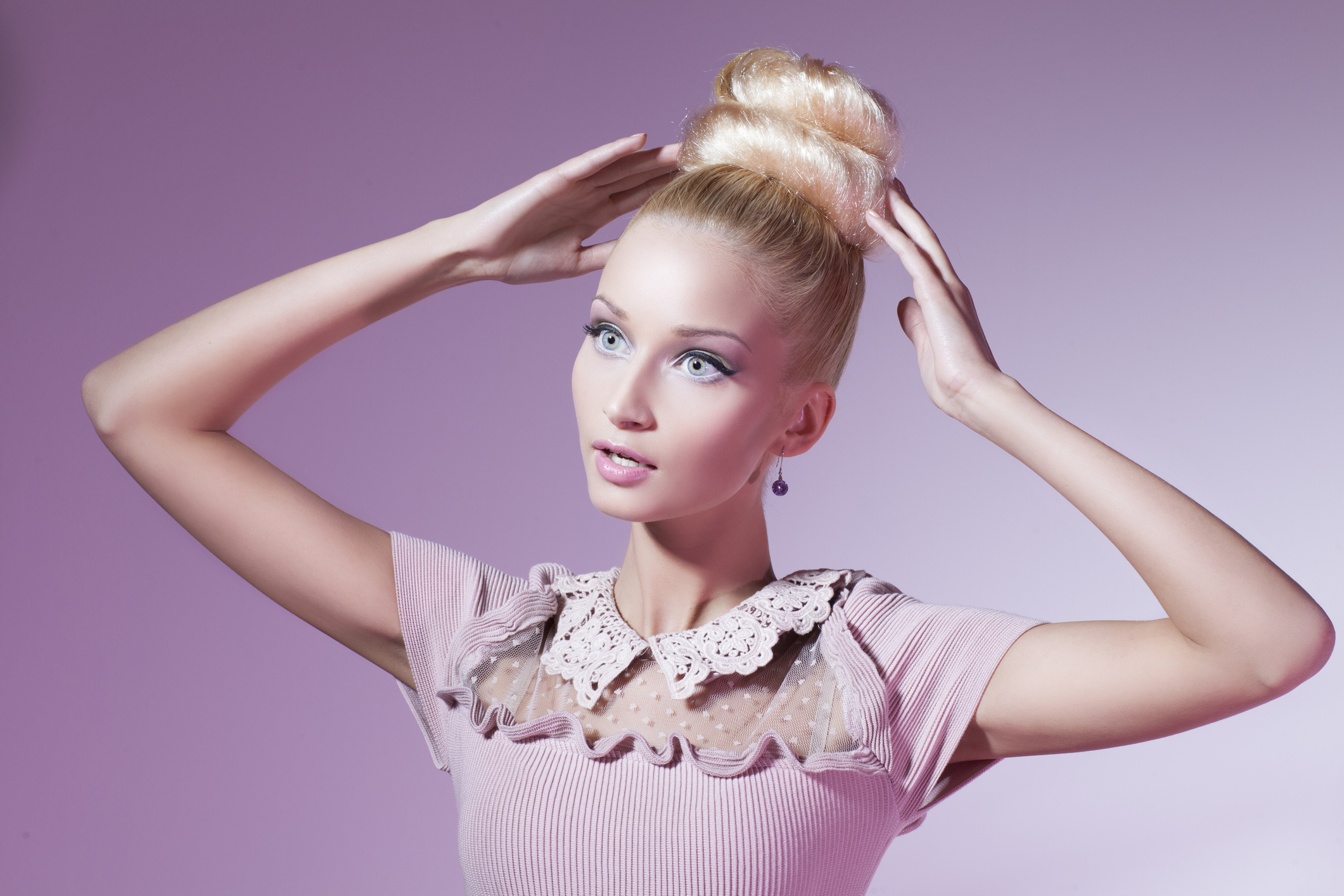 A model dressed up as a Barbie doll.