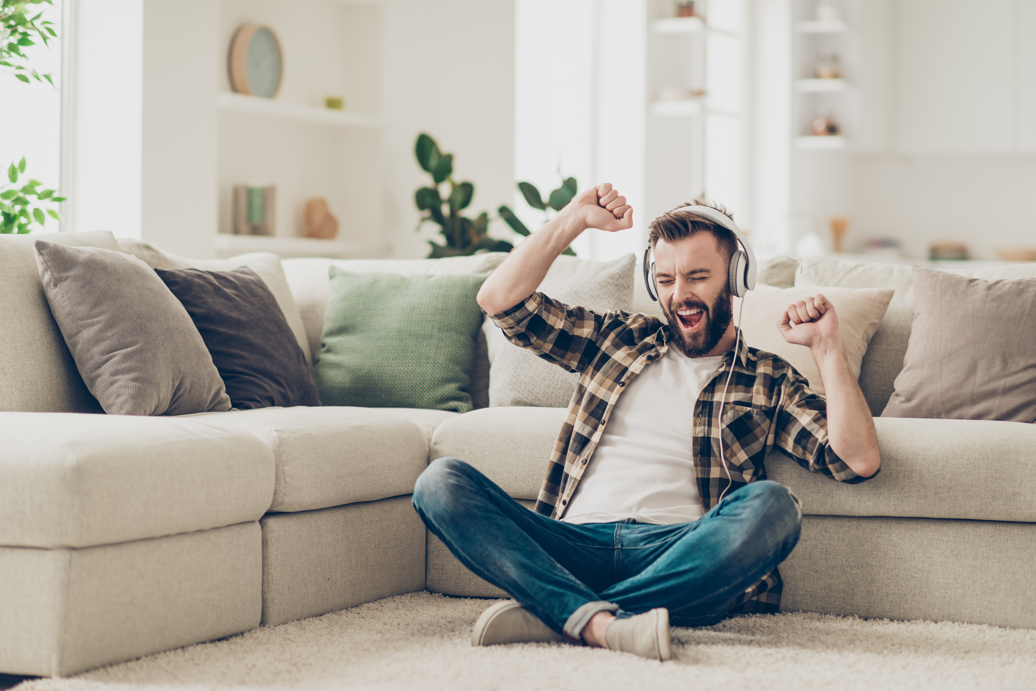 Man listening to music through headphones