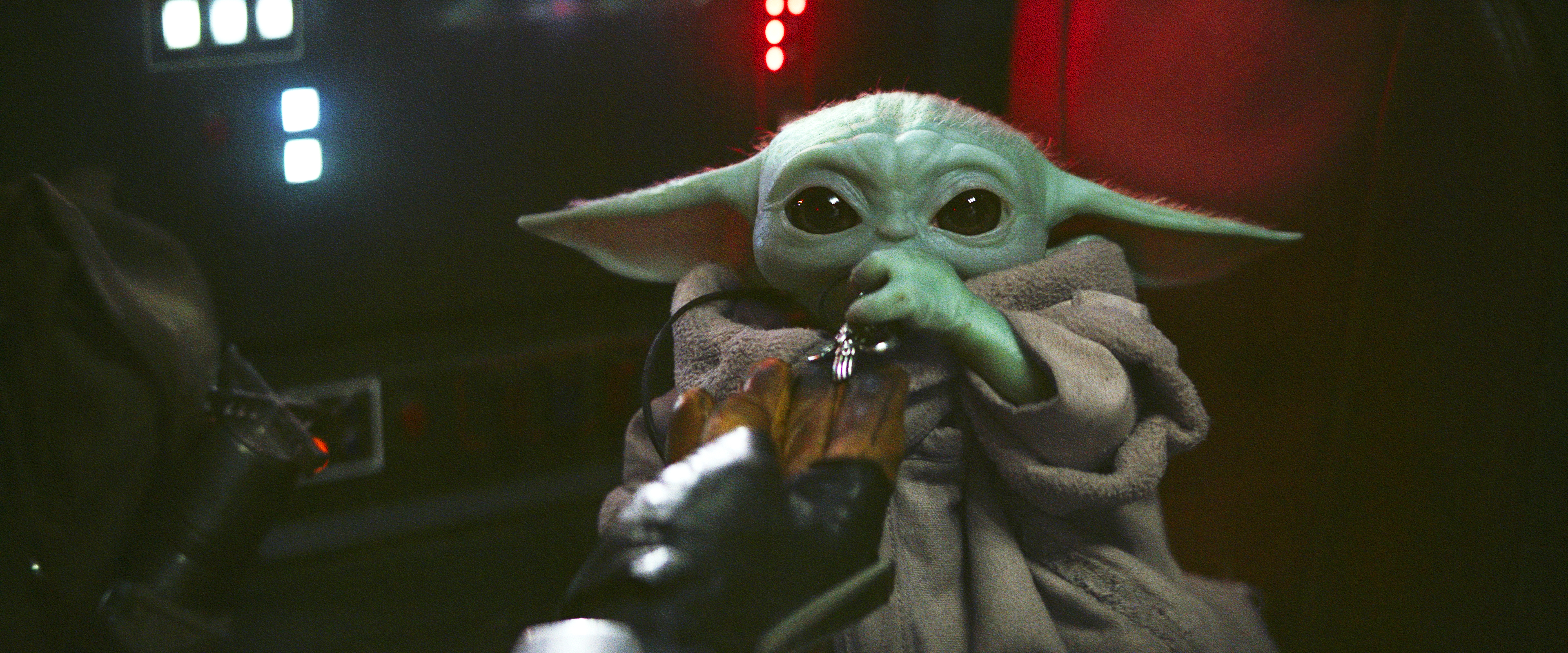 The Child, more commonly known as "Baby Yoda" is shown here in a scene from The Mandalorian.
