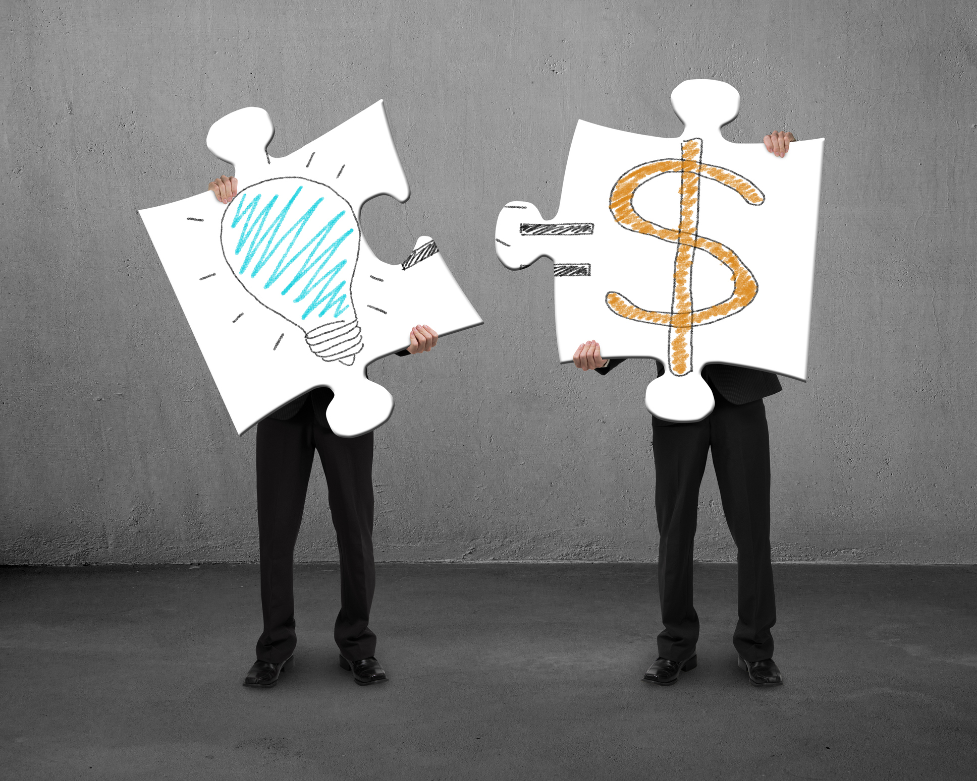 Two men holding giant jigsaw puzzle pieces with drawings of a light bulb, an equal sign, and a dollar symbol.