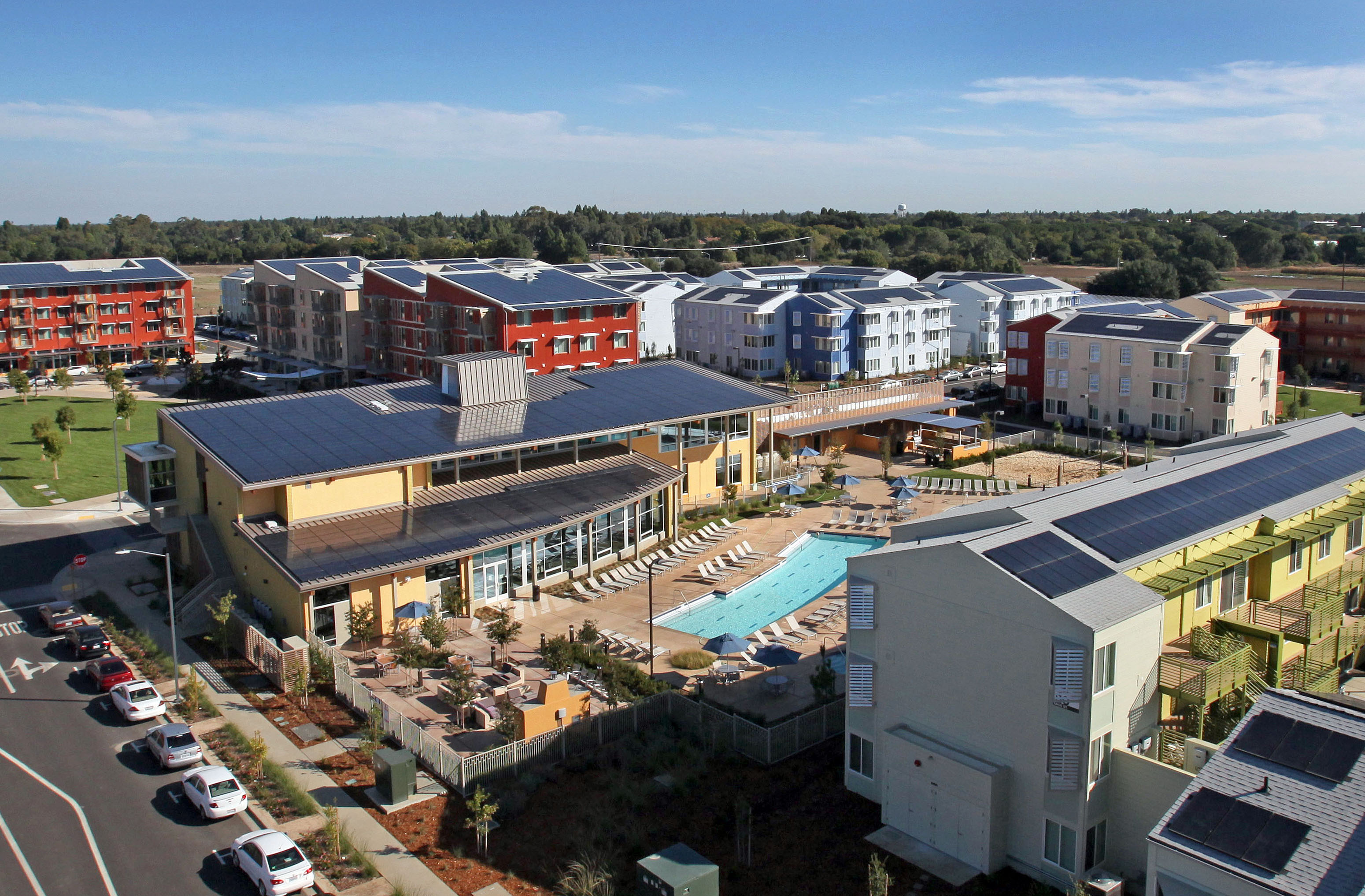 College campus with solar panels on the roofs. 