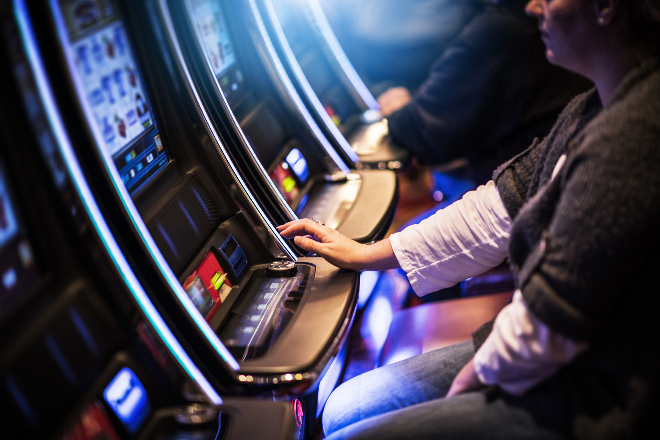 Photograph of slot machines in a casino.