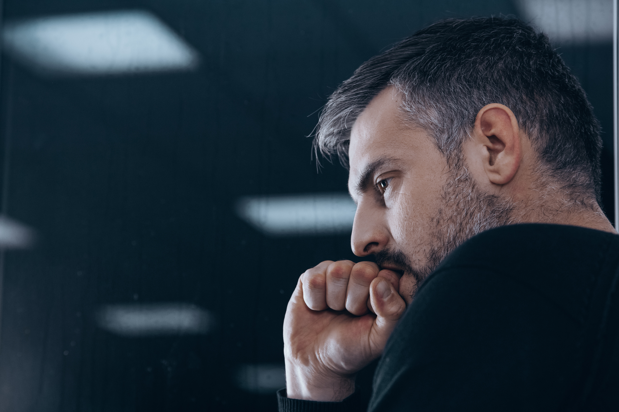 Side profile of serious man