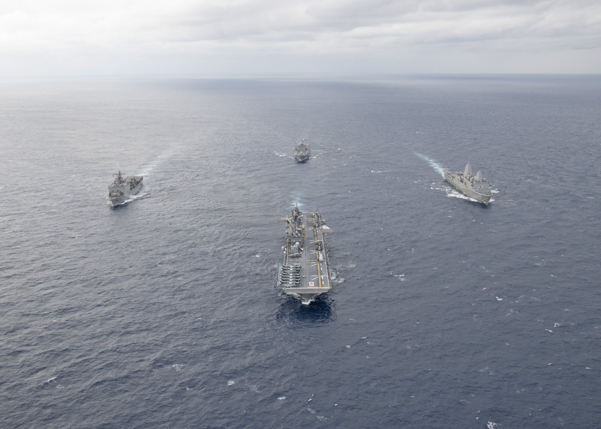 USS America and other warships steaming in formation
