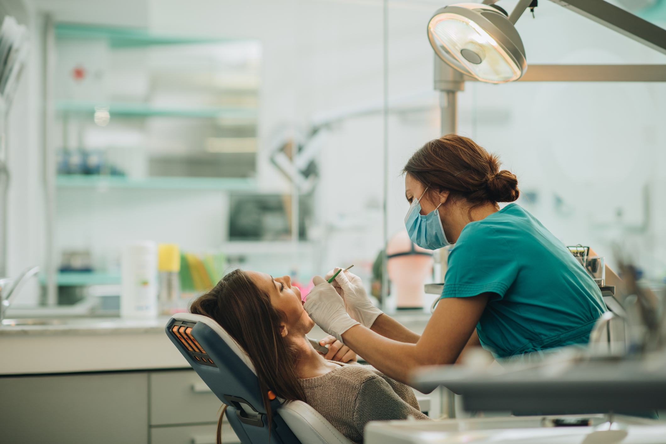 Dentist working on a patient's teeth.