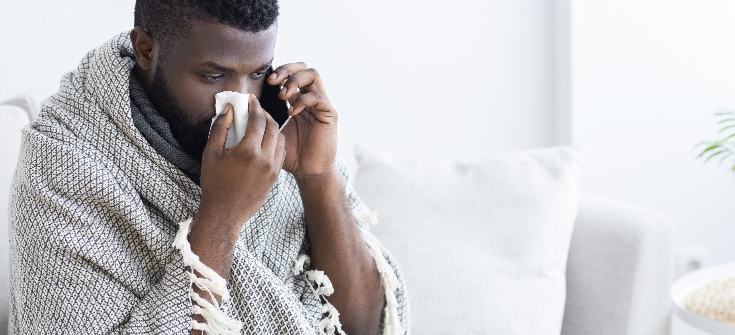 Sick man making a phone call.