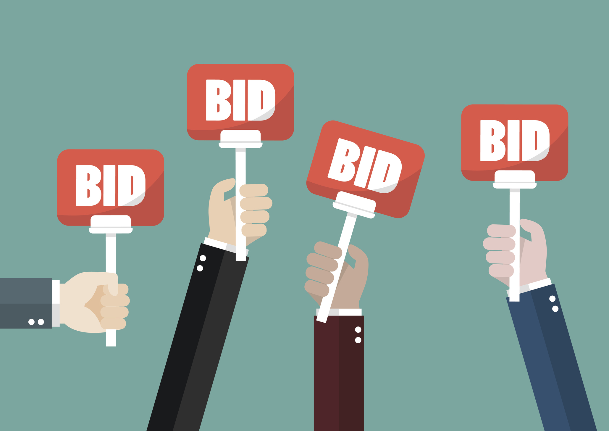 Hands raising auction bid signs