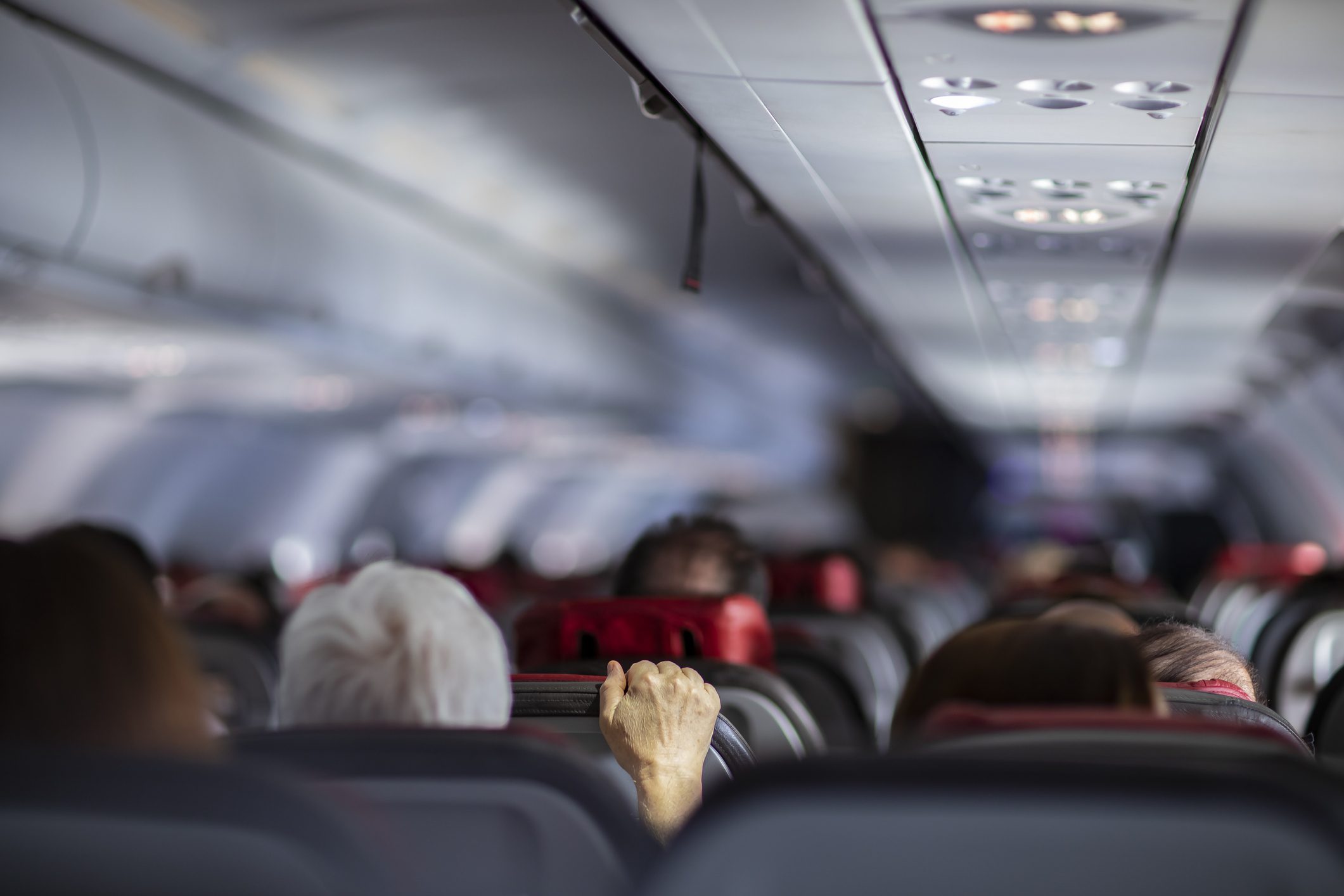 View from the rear of an airplane toward the front.