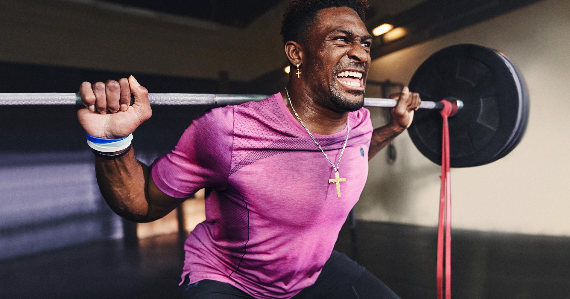 Athlete lifting weights.