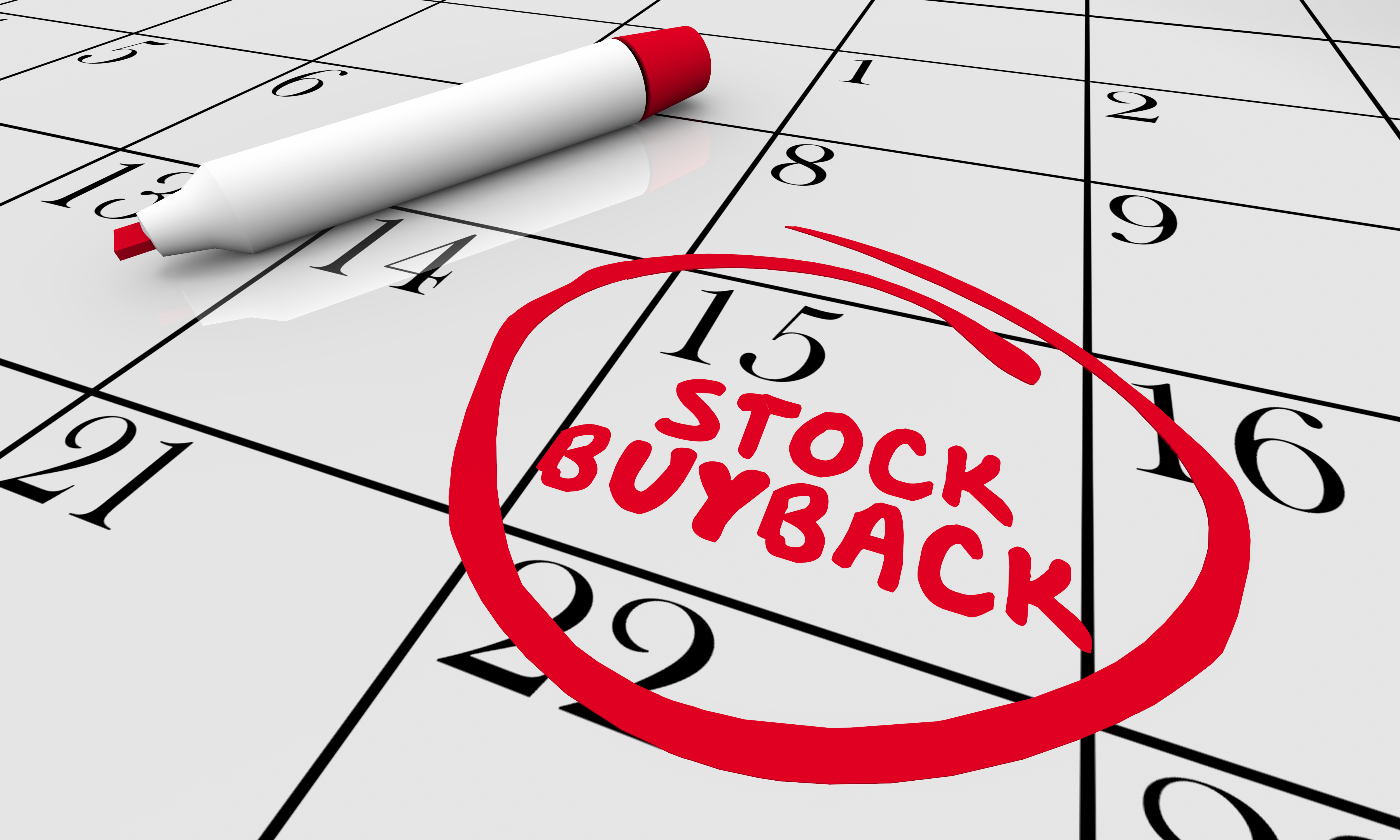 A calendar with "Stock Buyback" written in red marker.