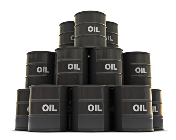Oil barrels stacked up on each other.