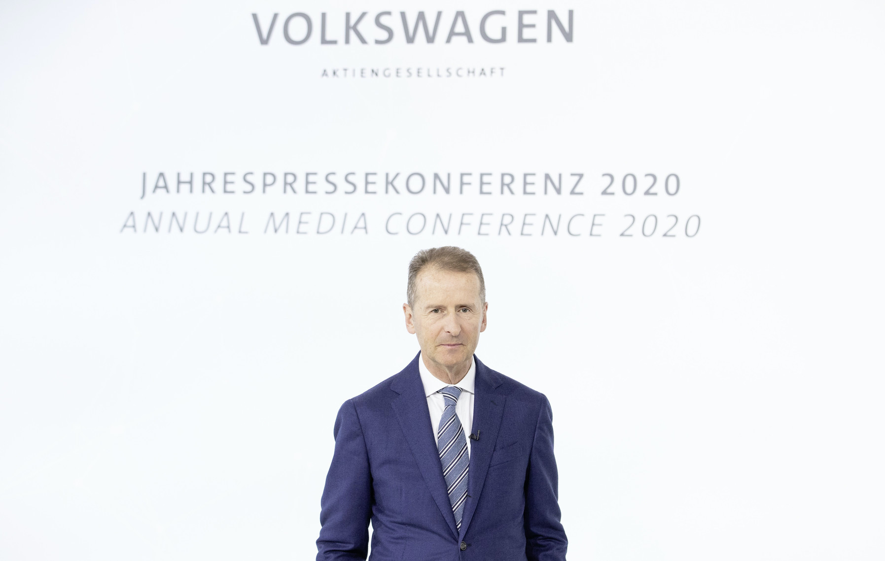 Diess is shown speaking at VW's annual conference in March 2020.