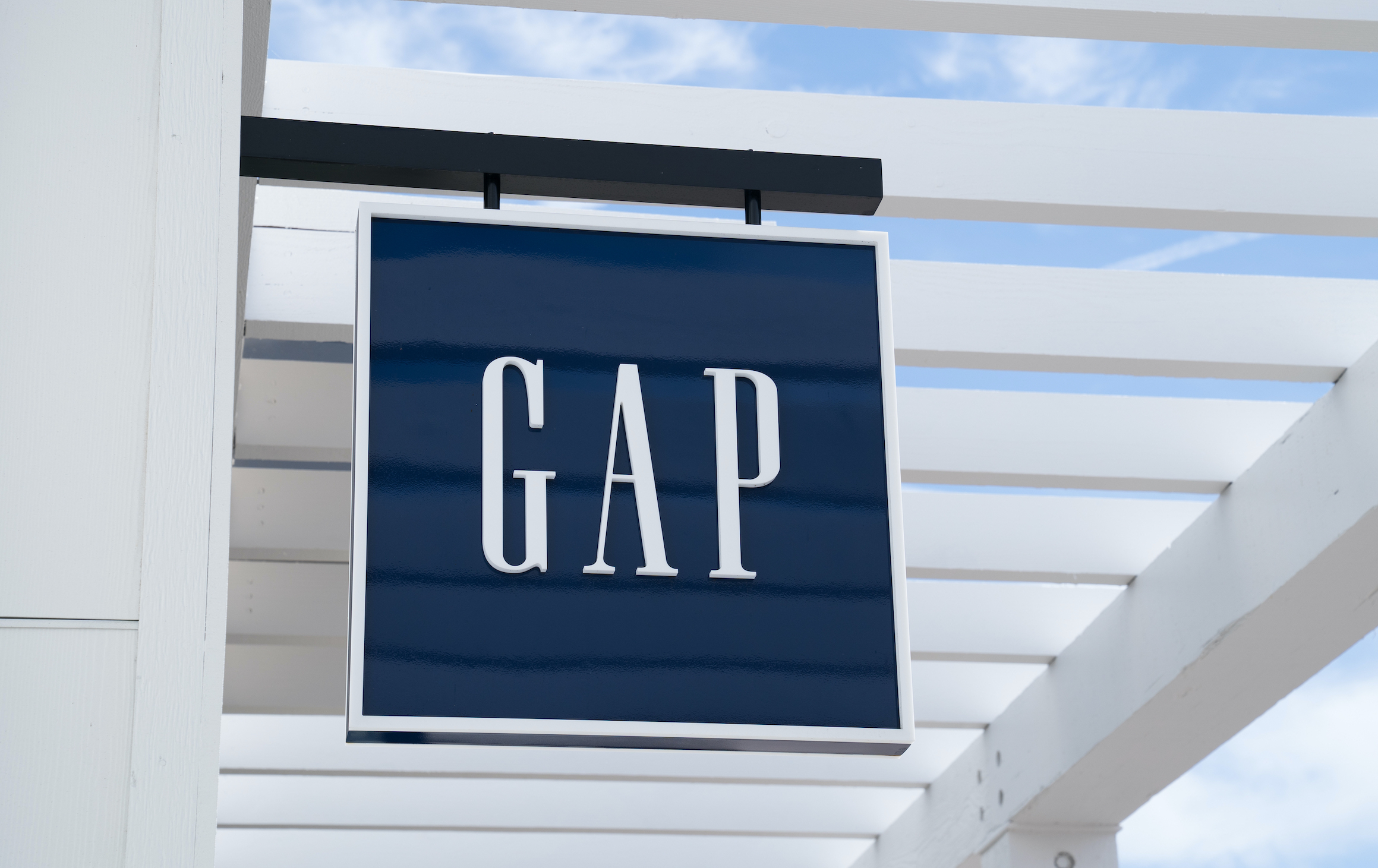A Gap sign outside a store.