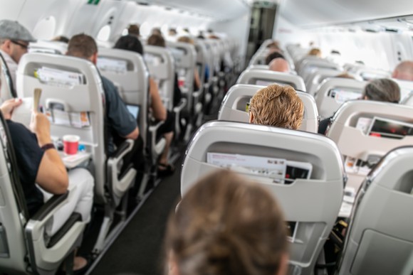 airplane passengers in seats