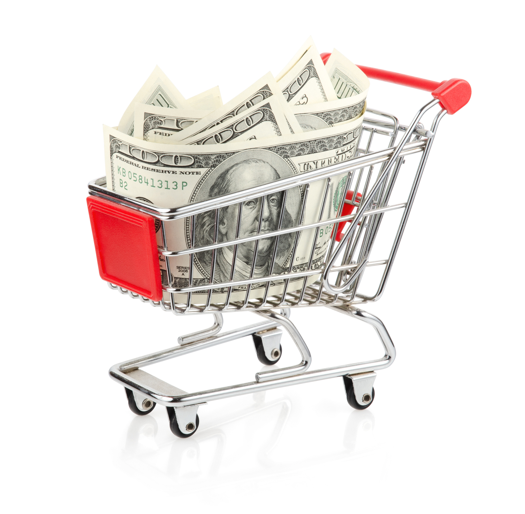 Tiny shopping cart with hundred dollar bills in it