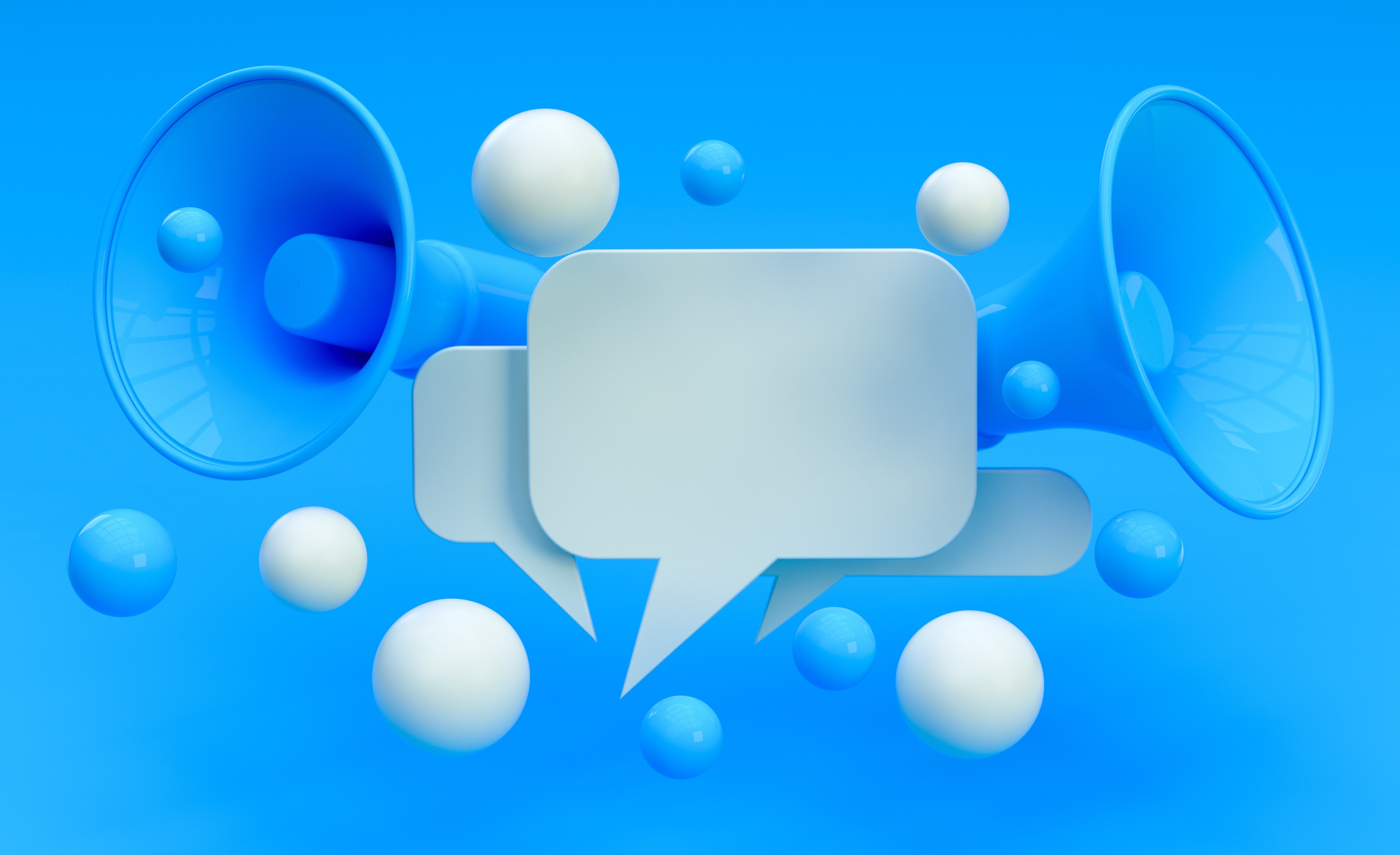 Two blue bull horns and white dialog boxes against a blue screen to depict online advertising.