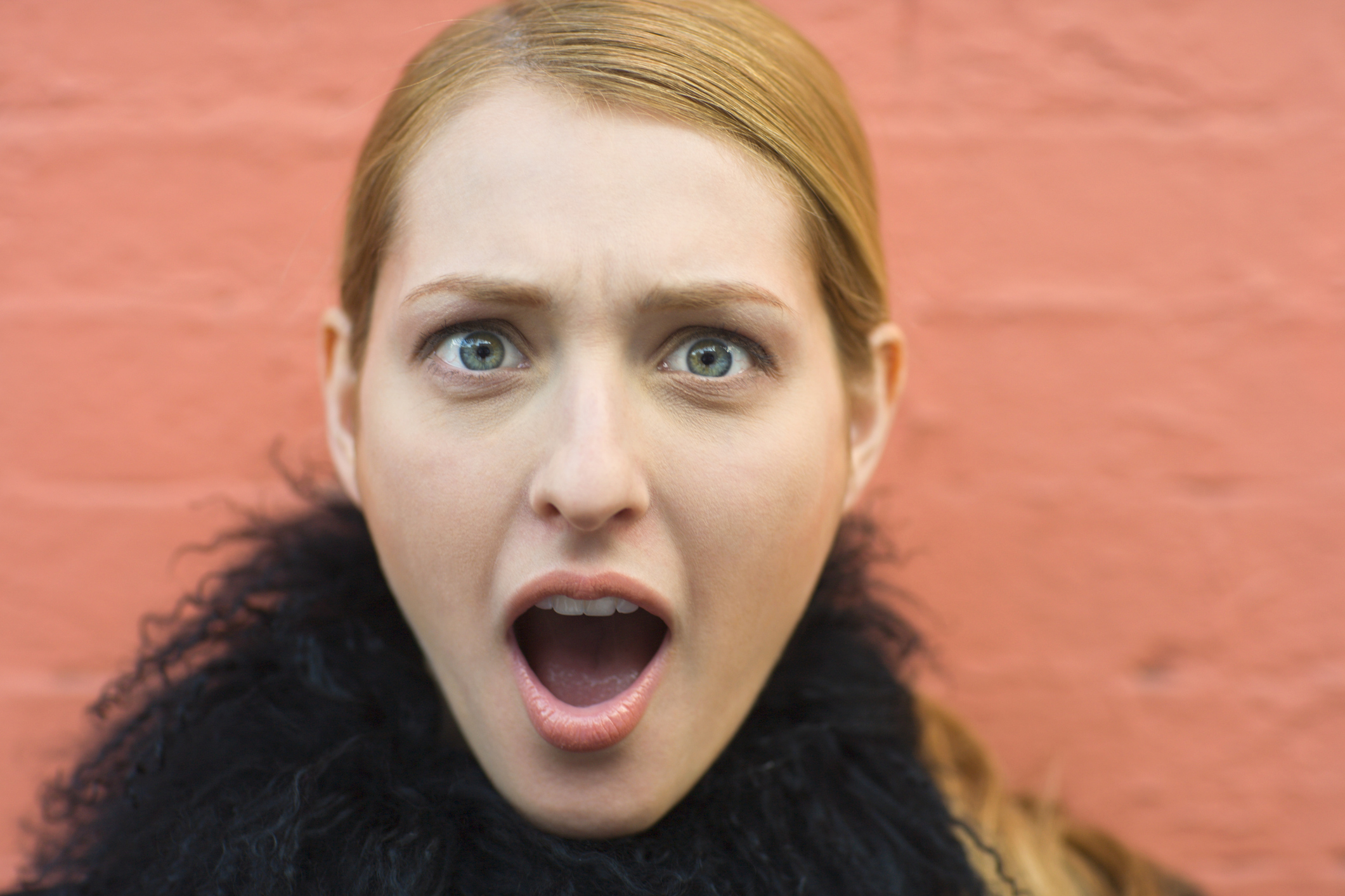 Young woman with shocked expression.