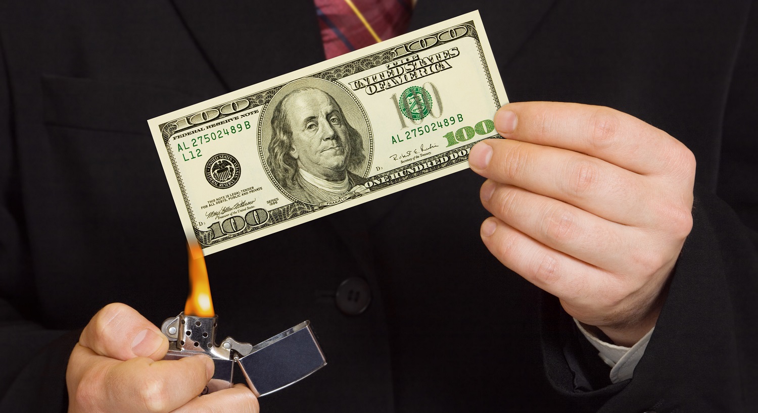 burning money in hand