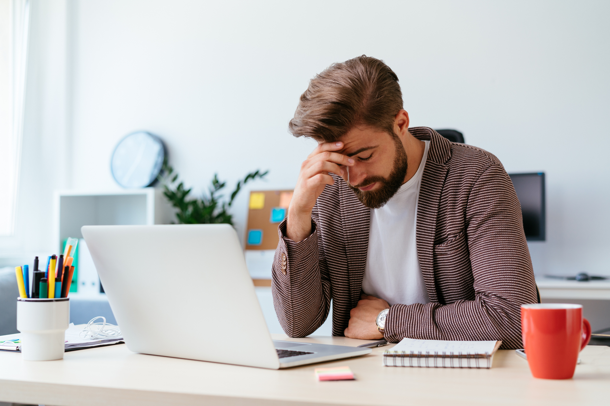 Man upset in home office