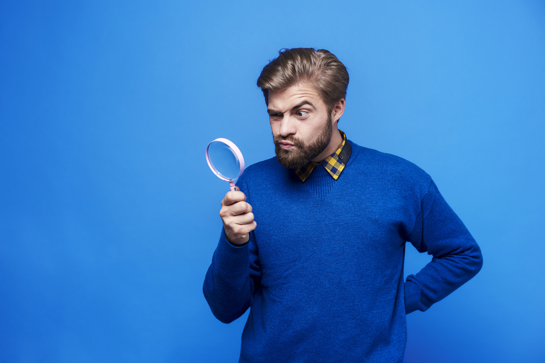 Getty Magnifying Glass with Bearded Man