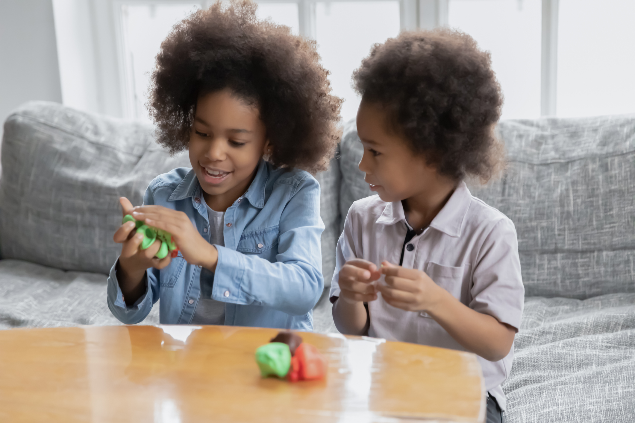 kids playing with play-doh at home