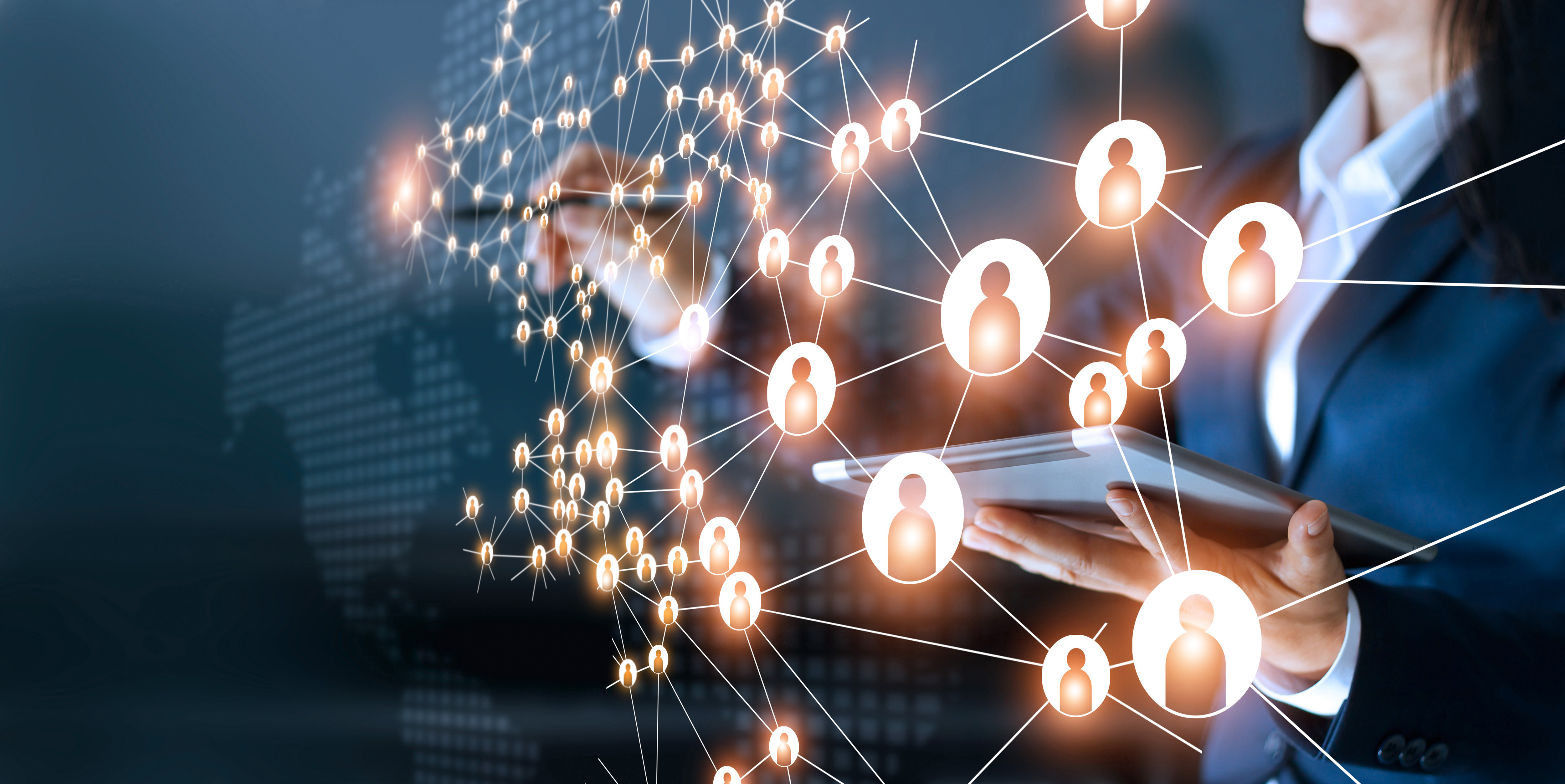 Person with a tablet interacting with a connected network of glowing people icons floating in the air.