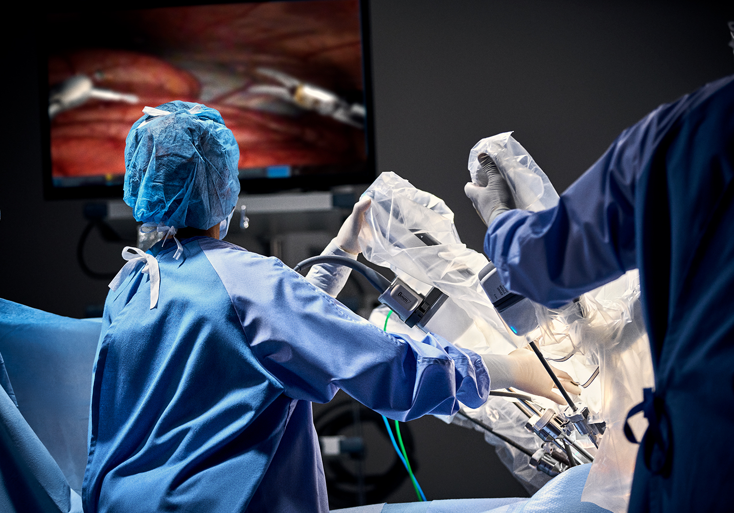 Da Vinci surgical robot and operating staff.