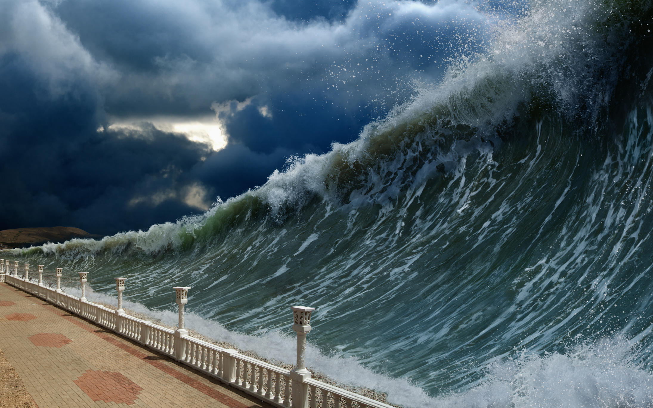 a giant tsunami heading towards land.