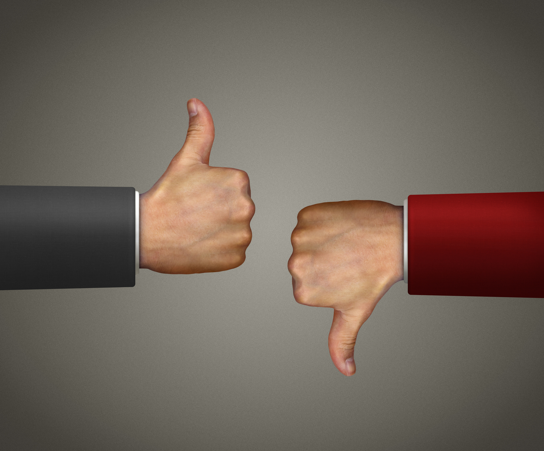 Two hands giving thumbs-up and thumbs-down