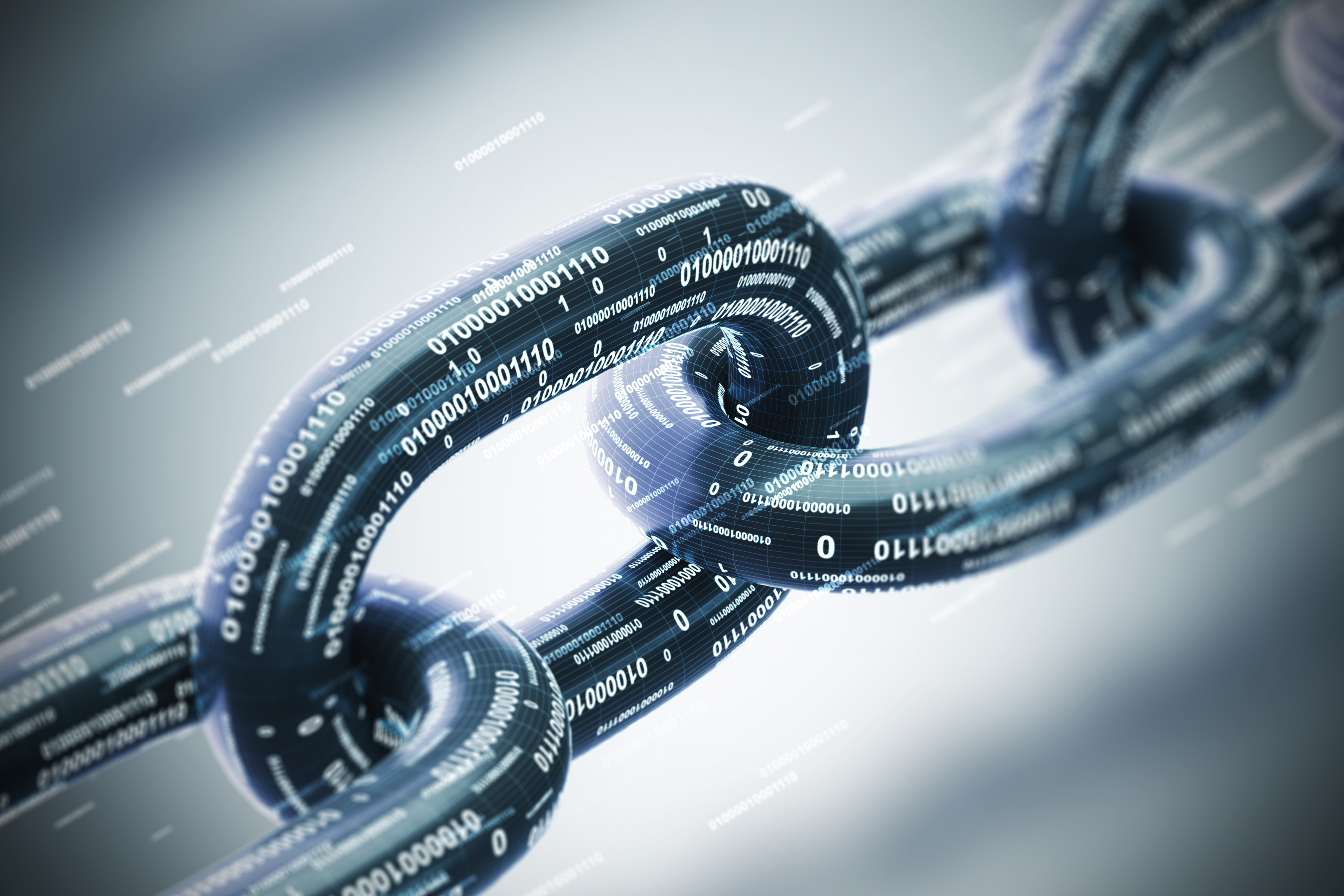 Links in a chain, comprised of computer binary code, representing blockchain.