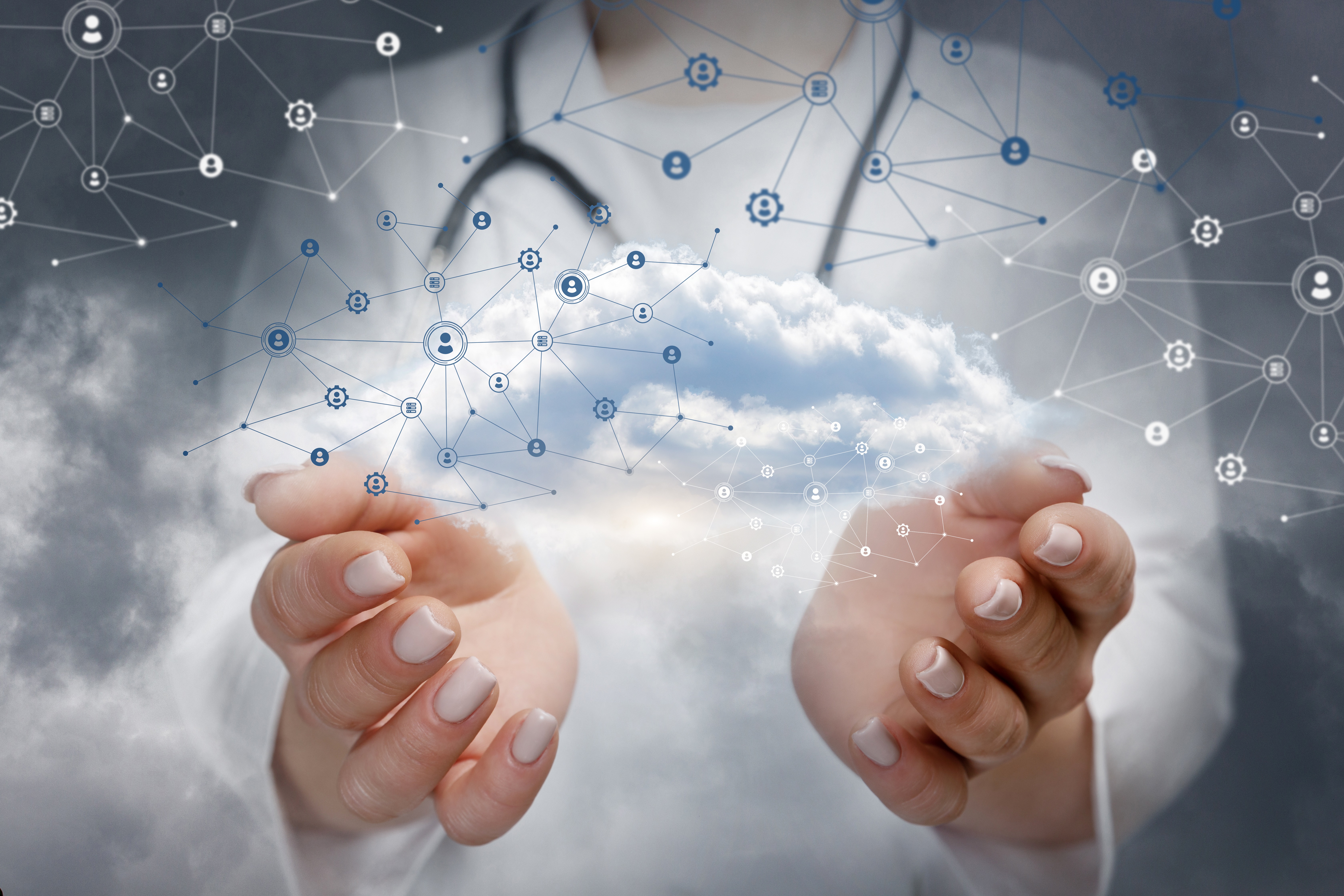 A doctor holding a cloud connected to digital data points.