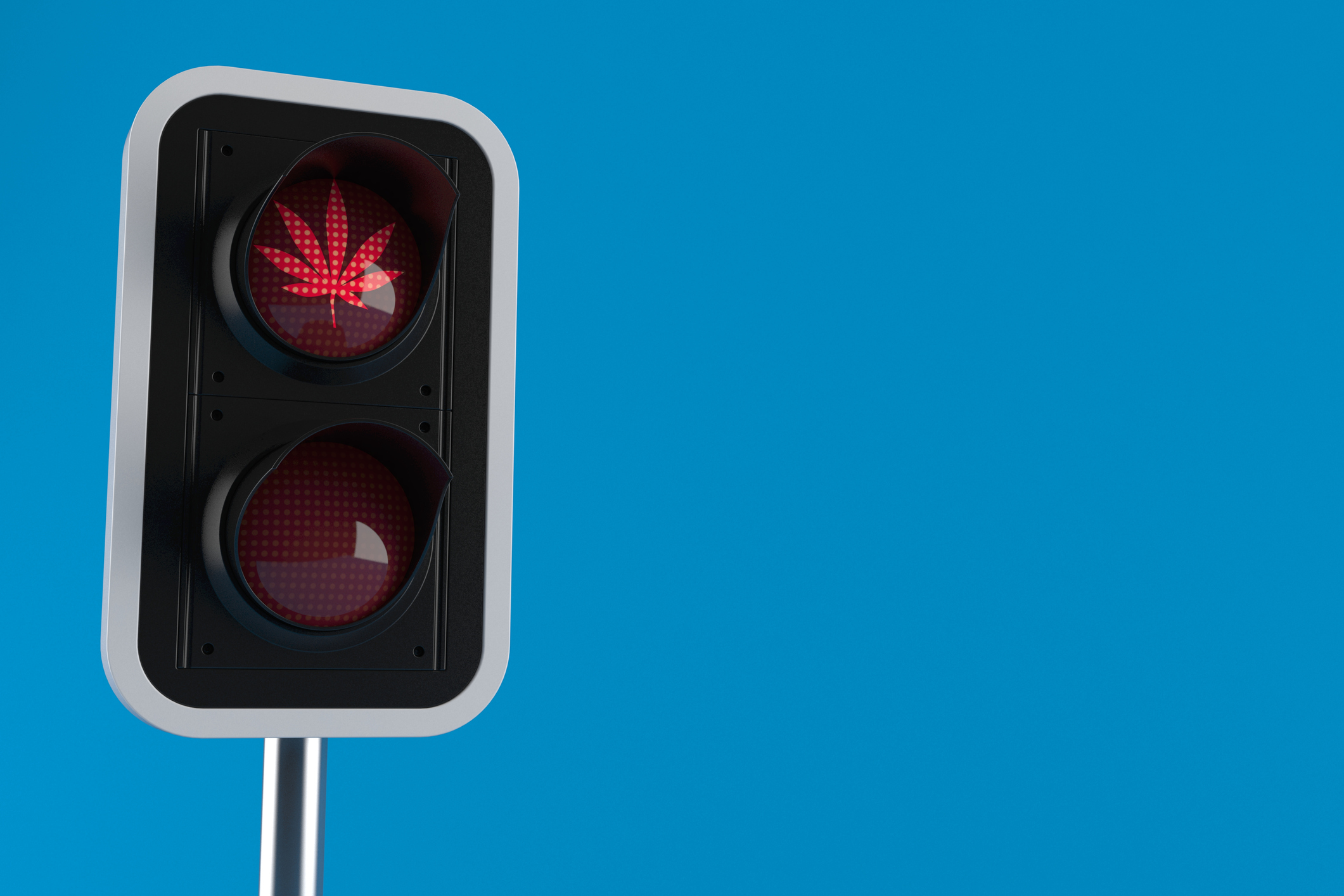 Traffic light displaying a red light with a cannabis leaf